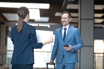 Fototapeta premium Smiling businessman feeling excited while meeting his business partner