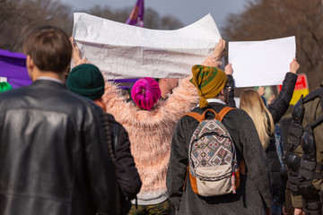 Young people at a peaceful demonstration in a modern city