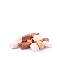 candies or caramel candies on a white background.