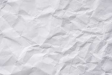 Abstract white crumpled paper texture background