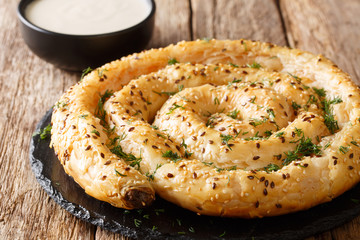 Homemade borek (burek) pie with feta cheese close-up. horizontal