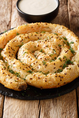 Tasty turkish borek pie (burek) with feta closeup. vertical