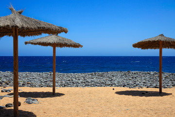 Clean sand and rock beach in Tenerife