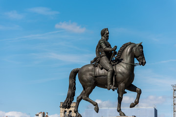 Fototapeta na wymiar Equestrian statue King Henri IV in Paris, epithet Good King Henry, was King of Navarre (as Henry III) from 1572 and King of France from 1589 to 1610