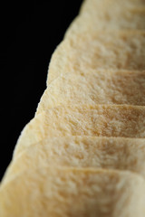 Potato chip on black background 