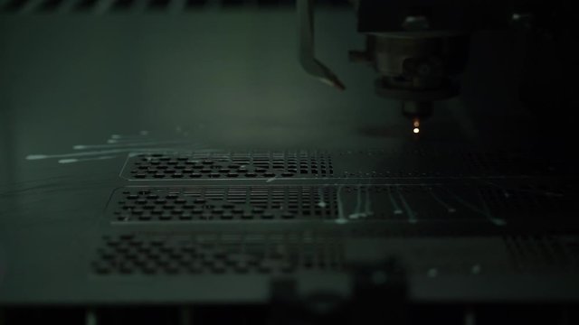 Super slow vdo EDM laser cutting machine demonstration close up