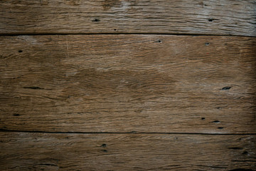 Fototapeta premium płaskie lay. ciemny stary drewniany stół tekstury tła. skopiuj miejsce na tekst lub obraz. widok z góry