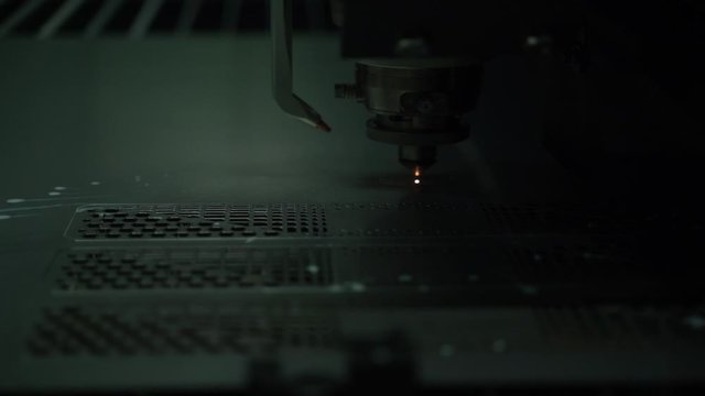 Super slow vdo EDM laser cutting machine demonstration close up