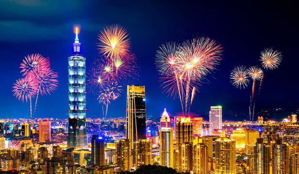 Fireworks over Taipei cityscape at night, Taiwan