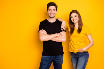 Photo of cheerful nice cute pretty beautiful couple of two people standing confidently in black...