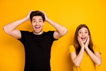 Photo of cheerful positive cute charming pretty couple rejoicing about seeing nice new information...