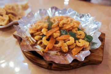 National chinese street food. Cast iron prawns and fried dumplings