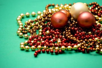 Christmas collection chains with bulbs on green background
