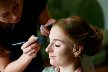 .Make-up artist doing makeup.Make up