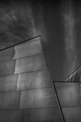 Abstract black and white dramatic modern architecture with  a sky in the background