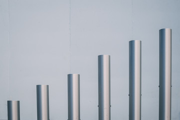 stainless steel vertical poles placed on steps