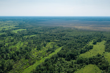Fototapeta na wymiar aerial photography landscape green forest and fields