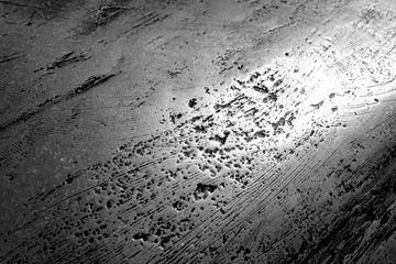 Metal rough surface in black and white.