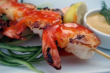 Grilled tasty shrimps with blur effect.