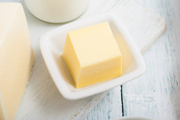 dairy products on old white wooden table