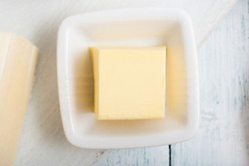 dairy products on old white wooden table