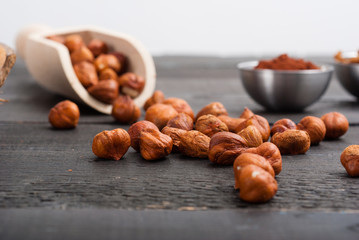 hazelnut cream ingredients on black wooden table