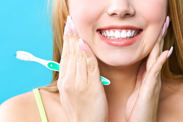 Perfect healthy teeth smile of a woman. Teeth Whitening. Dental health Concept. Promotional picture for a dental clinic.