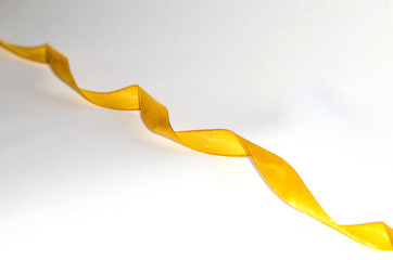 yellow ribbon on a white background