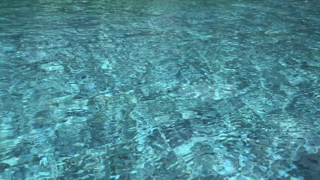 surface of blue water wave reflection on swimming pool absrtact background