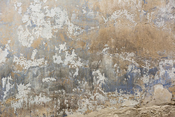Background weathered grey concrete wall with peeled off paint