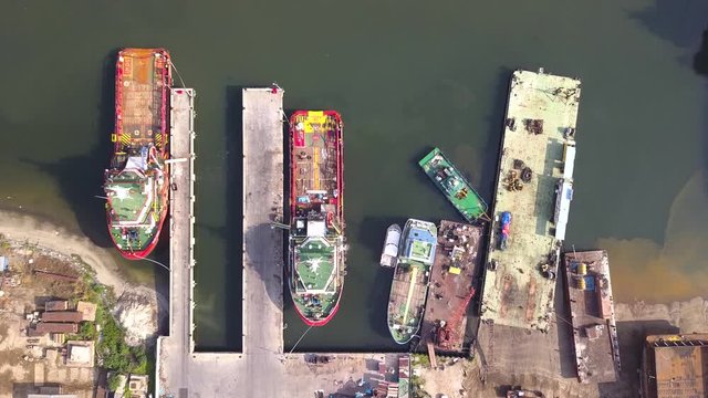 Aerial view looking top down of boats and vessels at the yard.