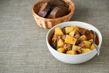 Beef stewed with potatoes and eggplants