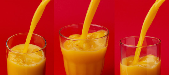 Orange juice pouring into glass on red color background
