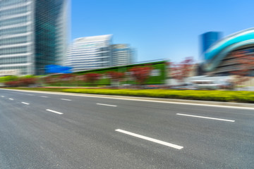 empty asphalt road front of modern buildings.