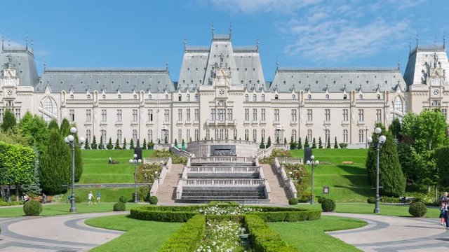 Iasi, Romania: Timelapse of the Palace of Culture Historical Landmark in Iasi, Romania. The iconic Palace of Culture in Iasi, Romania on a sunny summer day with blue sky. Iasi, Romania