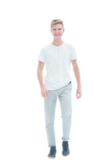 Fototapeta premium in full growth. smiling guy confidently goes to his goal.