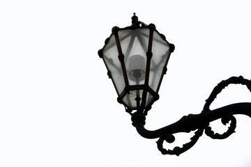 Fototapeta na wymiar Street lamp in front of Schoenbrunn Palace in Vienna, Austria