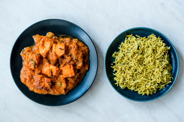 Indian Food Paneer Butter Tikka Masala / Cheese Cottage Curry and Jeera Zira Rice Basmati Pilaf or Pilav.
