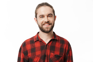 Bearded man posing isolated over white wall background.