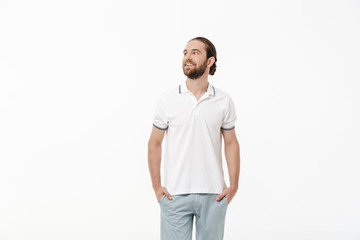 Fototapeta premium Handsome bearded man posing isolated over white background.