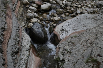 water flowing through the rocks