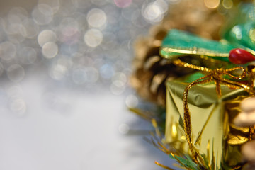 golden box with a lace and other shapes of attributes for christmas decoration