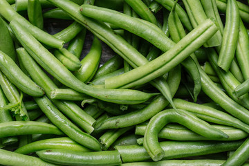 Ripe raw tasty healthy green beans, close up shot