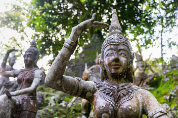 Fototapeta na wymiar Buddha statues at Tar Nim Waterfall & Secret Magic Garden on Koh Samui