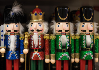 Close up on little Christmas toy soldier ornaments in a store