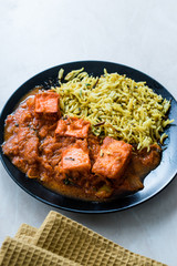 Indian Food Paneer Butter Tikka Masala / Cheese Cottage Curry and Jeera Zira Rice Basmati Pilaf or Pilav.