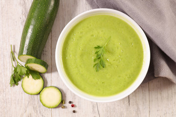zucchini soup in bowl, winter comfortable soup