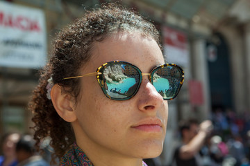 reflection of trevi fountain throught sunglasses 