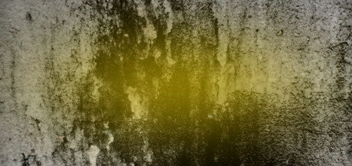 Old concrete wall background with orange light