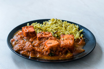 Indian Food Paneer Butter Tikka Masala / Cheese Cottage Curry and Jeera Zira Rice Basmati Pilaf or Pilav.